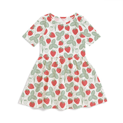 Kids dress with red strawberry print and green stems, made with organic cotton